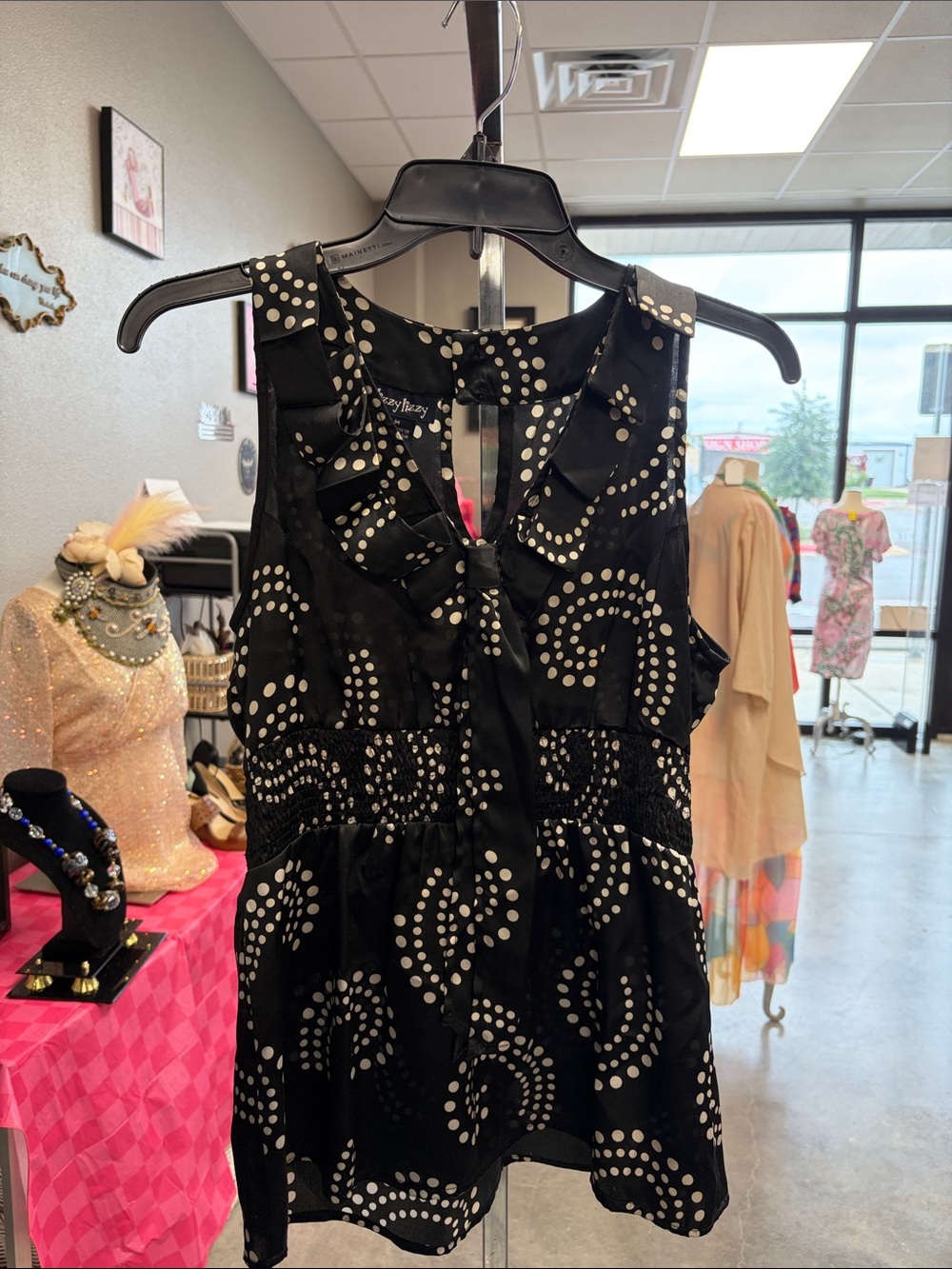 Sleeveless Black Polka-Arc Mini Dress with Ruffle Collar